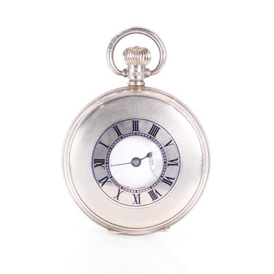 Lot 401 - A silver side wind half hunter pocket watch, by Bravingtons