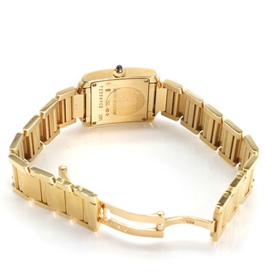 Lot 359 - A ladies' 18ct gold Cartier Tank Francaise quartz bracelet watch