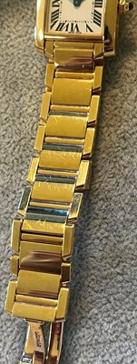 Lot 359 - A ladies' 18ct gold Cartier Tank Francaise quartz bracelet watch