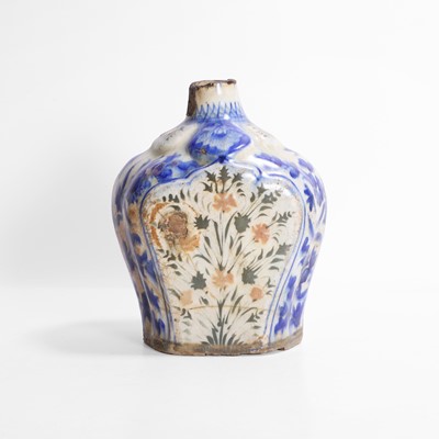 Lot 415 - A Safavid Kirman pottery bottle vase