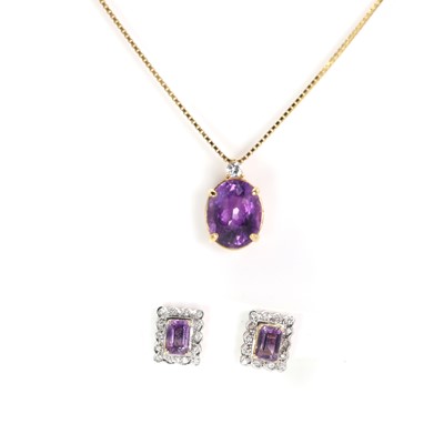 Lot 234 - An amethyst and diamond pendant and a pair of earrings