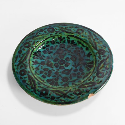 Lot 159 - A Persian turquoise-glazed pottery dish