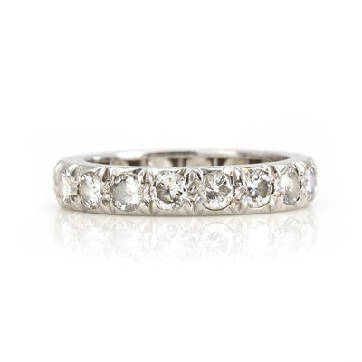 Lot 254 - A platinum and diamond eternity ring