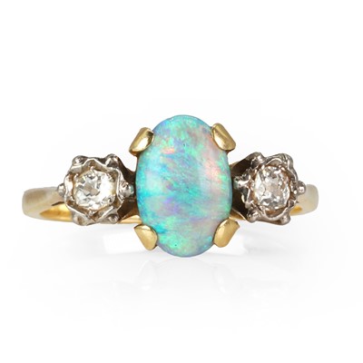Lot 53 - An opal and diamond three stone ring