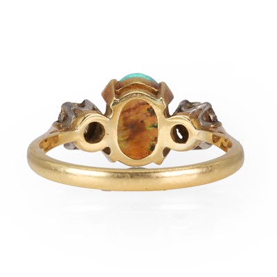 Lot 53 - An opal and diamond three stone ring