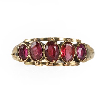Lot 23 - A Victorian gold rhodolite garnet five stone ring