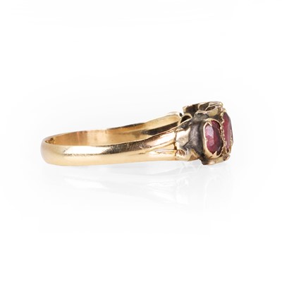 Lot 23 - A Victorian gold rhodolite garnet five stone ring