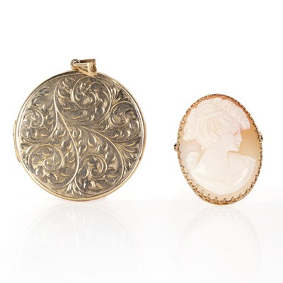 Lot 312 - A 9ct gold locket pendant and a 9ct gold shell cameo brooch