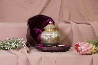 Lot 327 - A Victorian silver-gilt tea caddy and spoon