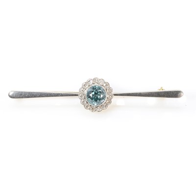 Lot 105 - A diamond and zircon cluster bar brooch