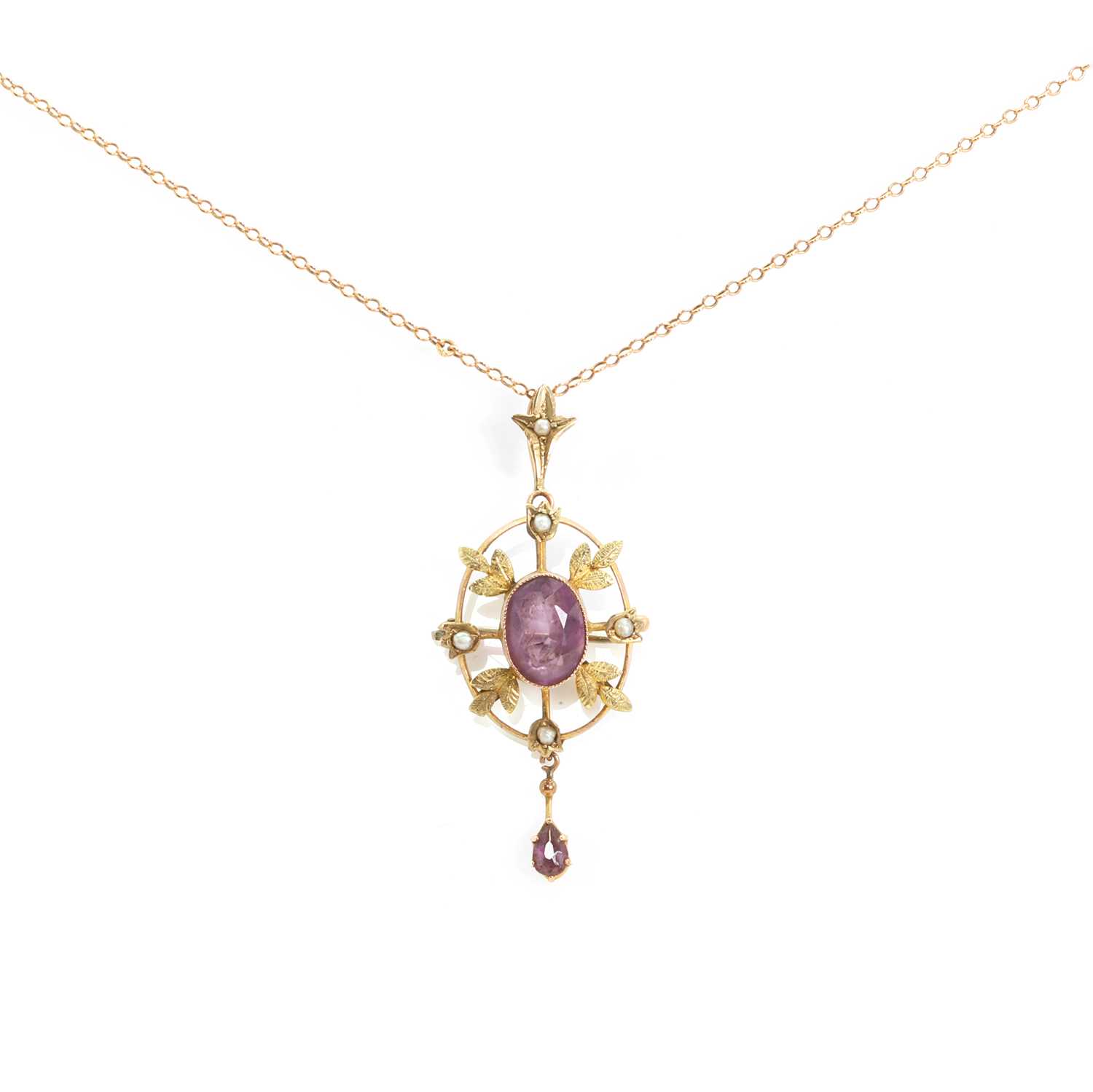 Lot 20 - An Edwardian amethyst and split pearl drop pendant/brooch