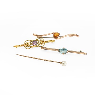 Lot 243 - A group of three bar brooches and a stick pin