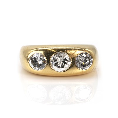 Lot 188 - A gold diamond three stone ring