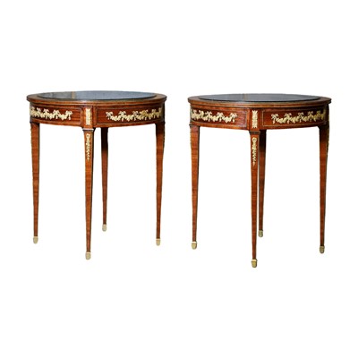 Lot 380 - A pair of Louis XVI style mahogany and gilt mounted side tables