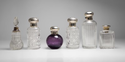 Lot 101 - Six silver-mounted scent bottles
