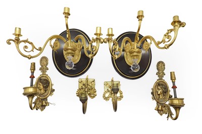 Lot 509 - Two pairs of gilt twin branch wall lights