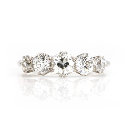Lot 82 - A platinum and diamond five stone ring