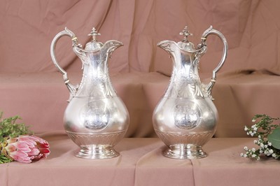 Lot 319 - A pair of Victorian silver coffee jugs