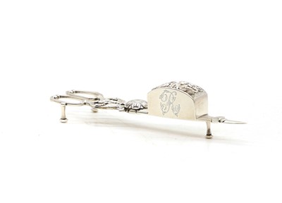 Lot 39 - A pair of George IV silver candle snuffers