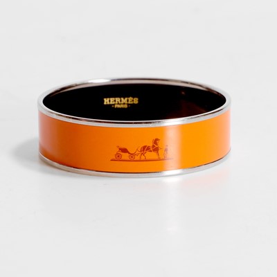 Lot 171 - A Hermes orange bangle