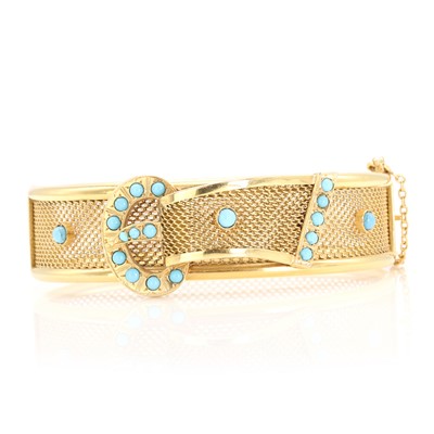 Lot 113 - A 19ct gold turquoise set bangle