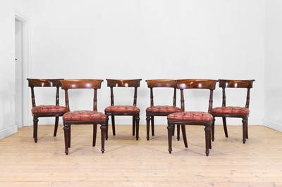 Lot 124 - A set of six mahogany and buttoned-leather dining chairs