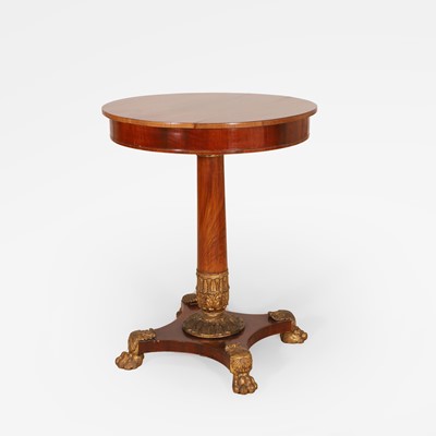 Lot 572 - A mahogany lamp table