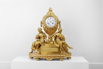Lot 385 - A Louis XVI-style gilt-bronze mantel clock