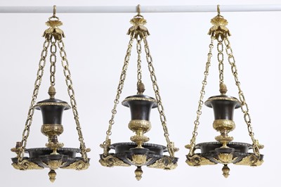 Lot 105 - A set of three Regency-style gilt and patinated bronze colza chandeliers