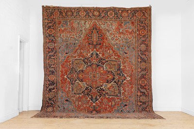 Lot 240 - A Heriz wool carpet