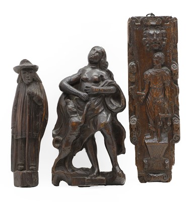Lot 201 - A group of three oak figural carvings