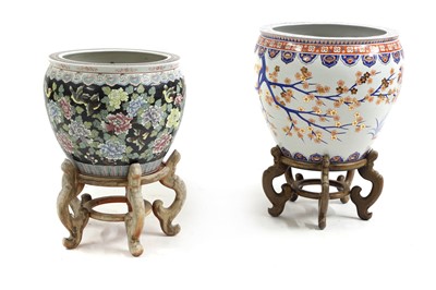 Lot 254 - Two large Chinese fish bowls on stands