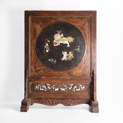 Lot 574 - A Chinese hardwood table screen