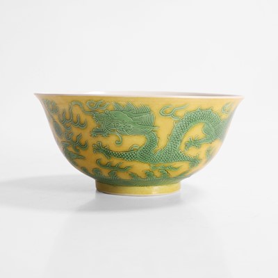Lot 311 - A Chinese yellow ground and green-enamelled bowl