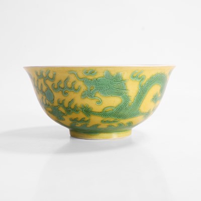 Lot 310 - A Chinese yellow ground and green-enamelled bowl