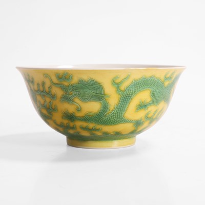 Lot 312 - A Chinese yellow ground and green-enamelled bowl