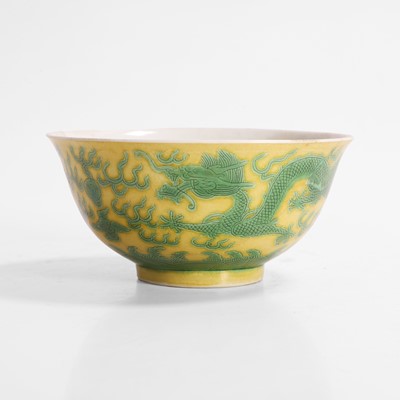 Lot 313 - A Chinese yellow ground and green-enamelled bowl