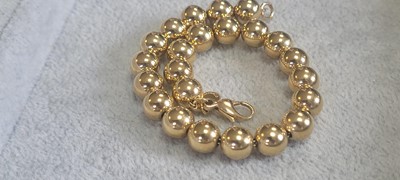 Lot 275 - An 18ct gold Hardwear ball bracelet, by Tiffany & Co.