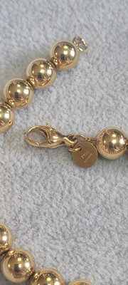 Lot 275 - An 18ct gold Hardwear ball bracelet, by Tiffany & Co.