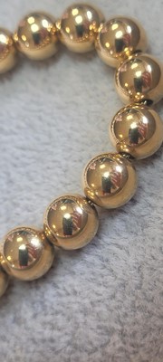 Lot 275 - An 18ct gold Hardwear ball bracelet, by Tiffany & Co.