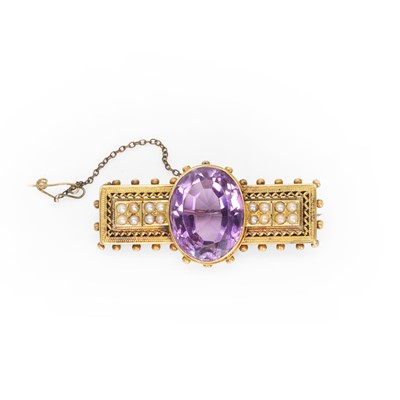 Lot 22 - A Victorian amethyst and split pearl brooch