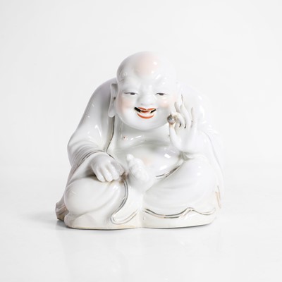 Lot 76 - A Chinese porcelain budai
