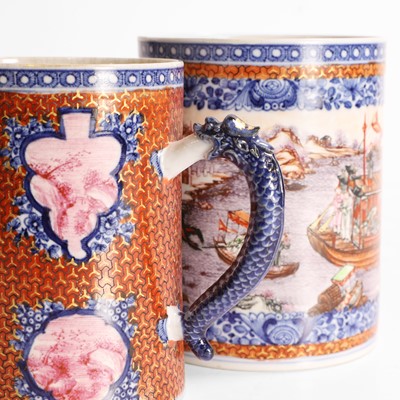 Lot 57 - A pair of Chinese export famille rose mugs