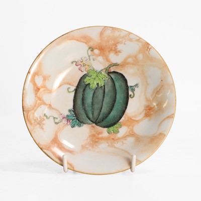 Lot 131 - A Chinese faux-marble enamelled porcelain saucer