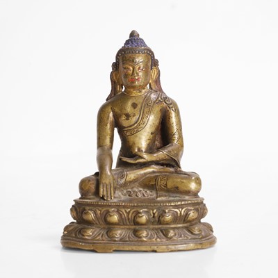 Lot 148 - A Tibetan bronze Shakyamuni Buddha