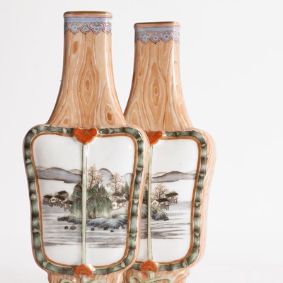 Lot 140 - A pair of Chinese faux bois-enamelled porcelain vases