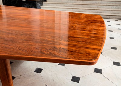 Lot 381 - A rosewood table and sixteen matching chairs