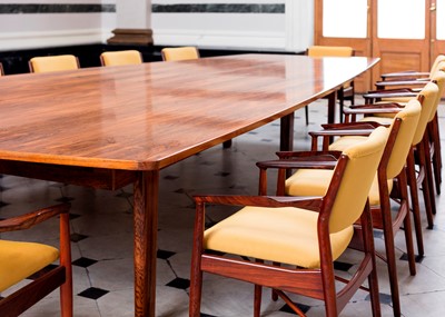 Lot 381 - A rosewood table and sixteen matching chairs