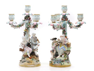 Lot 314 - A pair of Meissen porcelain candlesticks