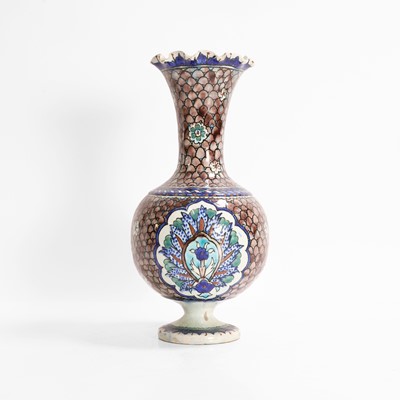 Lot 455 - A Turkish polychrome-painted glazed pottery vase